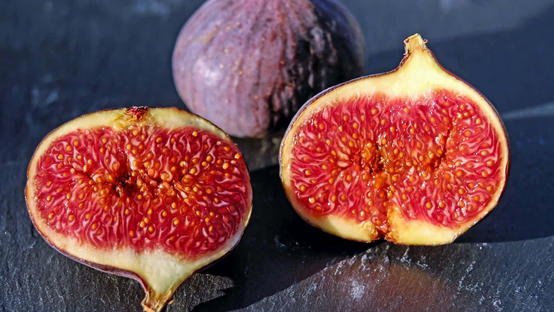 Enjoy an abundance of nature's sweetest fruit: purple figs. Wallpaper