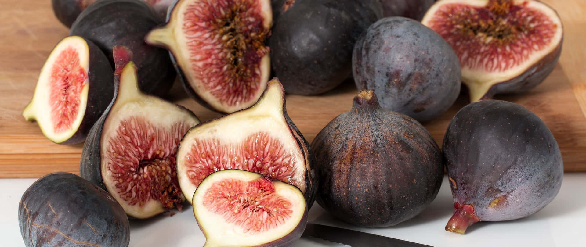 Taste the sweet satisfaction of fresh ripe purple figs!" Wallpaper