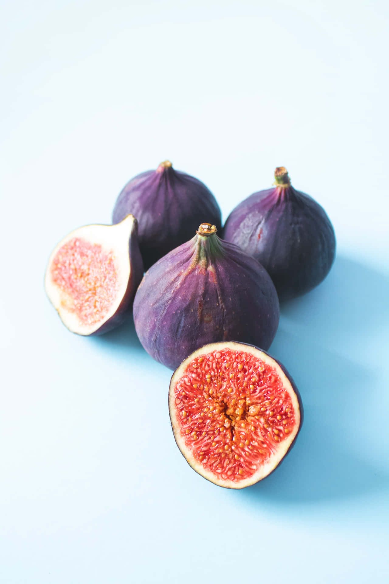 Enjoy the Surprising Sweetness of Purple Figs Wallpaper