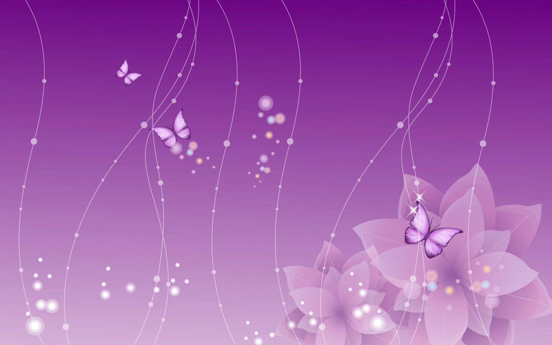 A Purple Flower Blooms on a Laptop Wallpaper