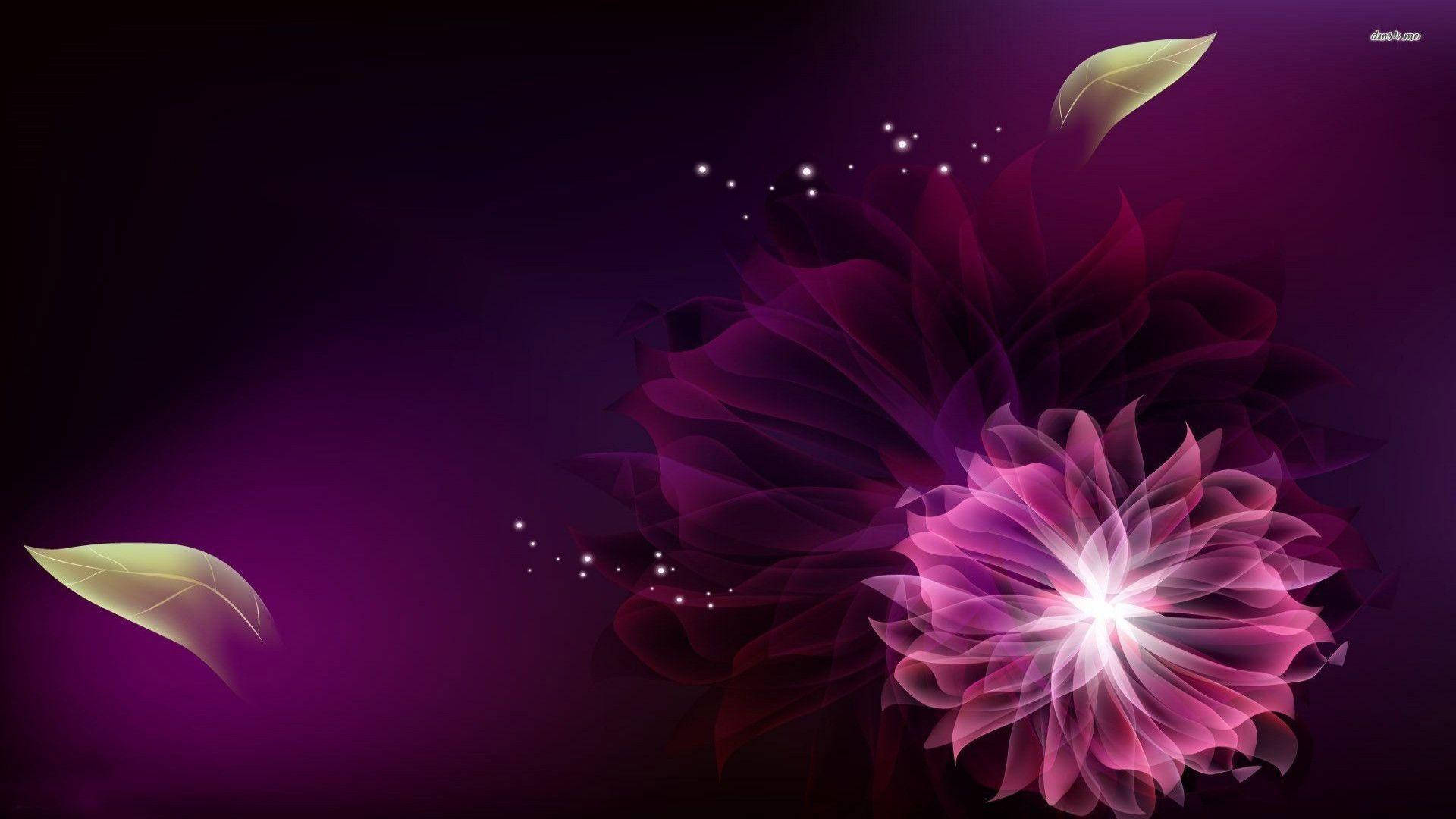 A beautiful purple flower blooming on a laptop computer. Wallpaper