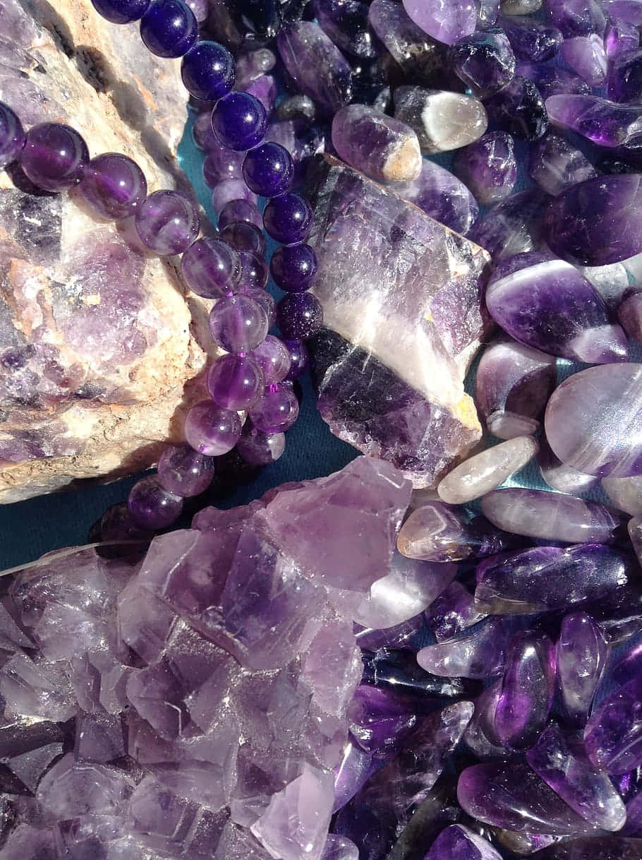 Caption: Sparkling Purple Gemstone Beads & Minerals Wallpaper