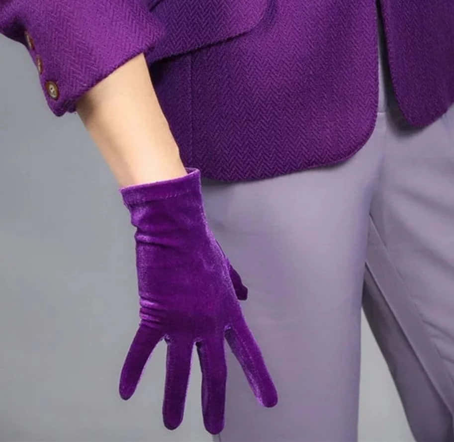 Protect your hands with style in these bold purple gloves. Wallpaper