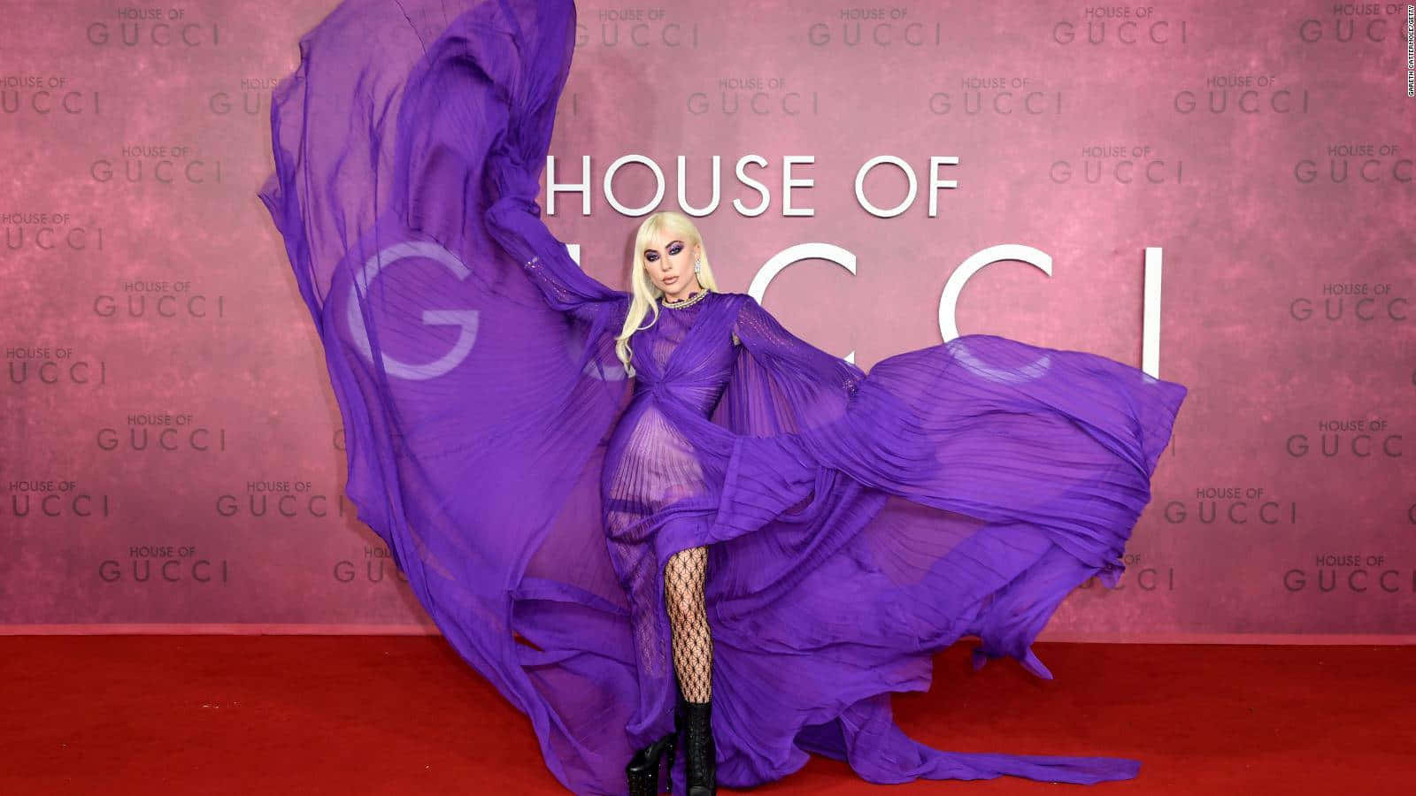 "Feel the luxury with this Purple Gucci ensemble" Wallpaper