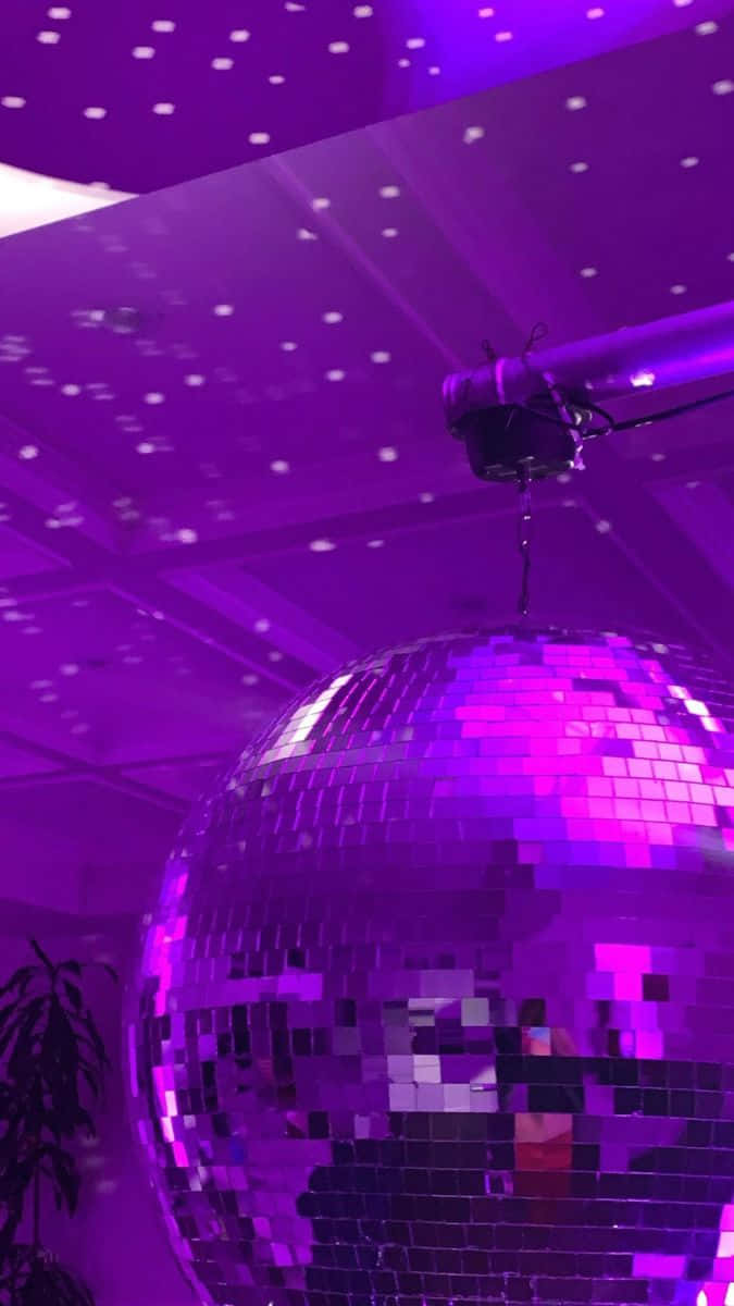 Purple Hued Disco Ball Party Wallpaper