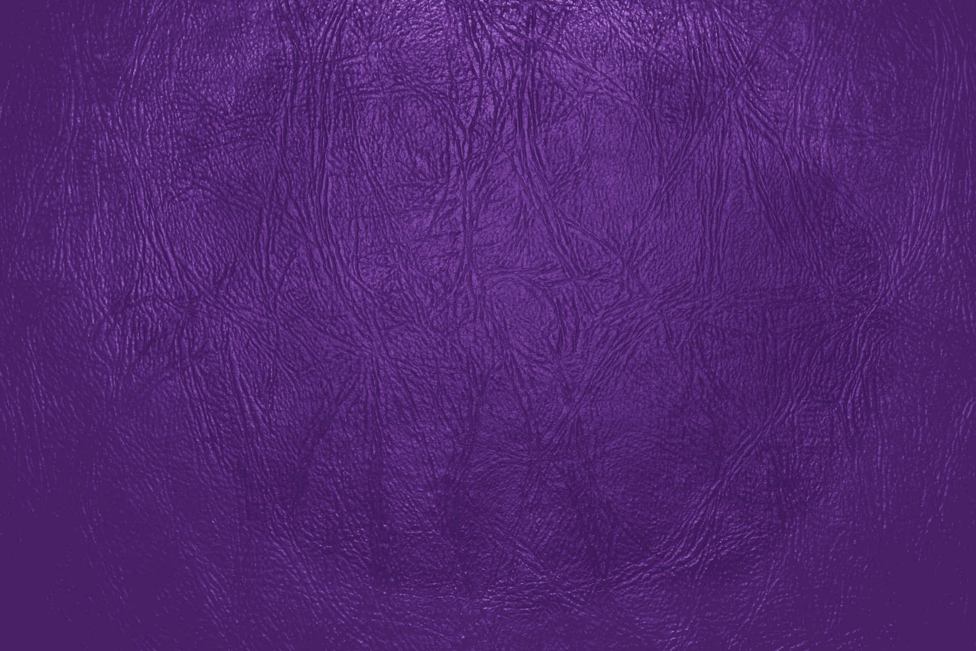 Experience Luxury with Purple Leather Wallpaper