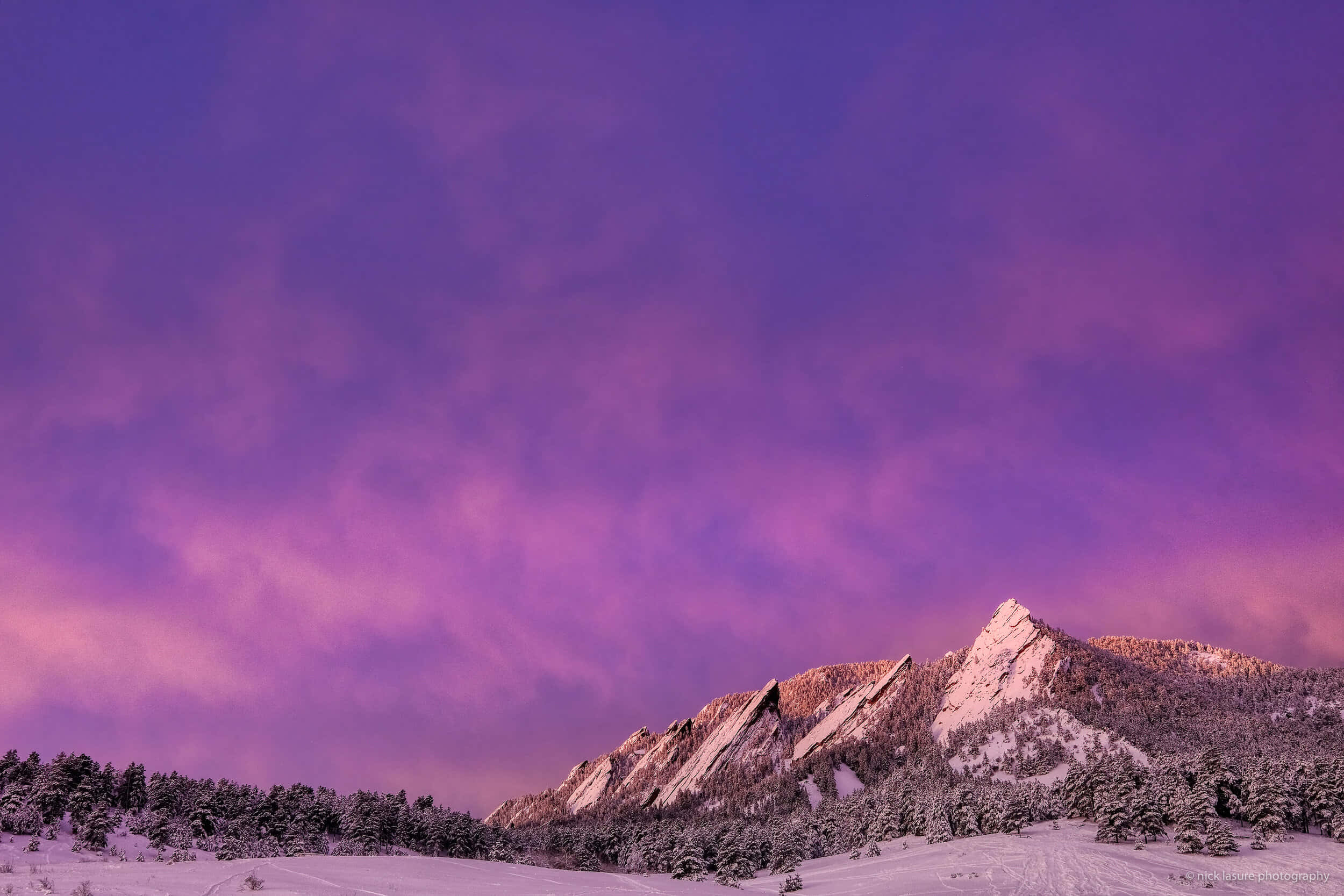 Soar over the majestic Purple Mountains Wallpaper