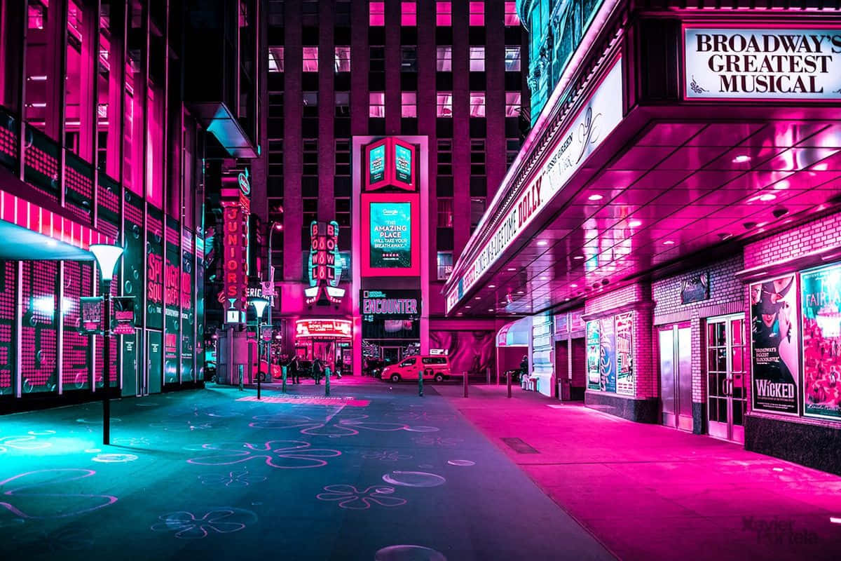 A City Street With Neon Lights Wallpaper