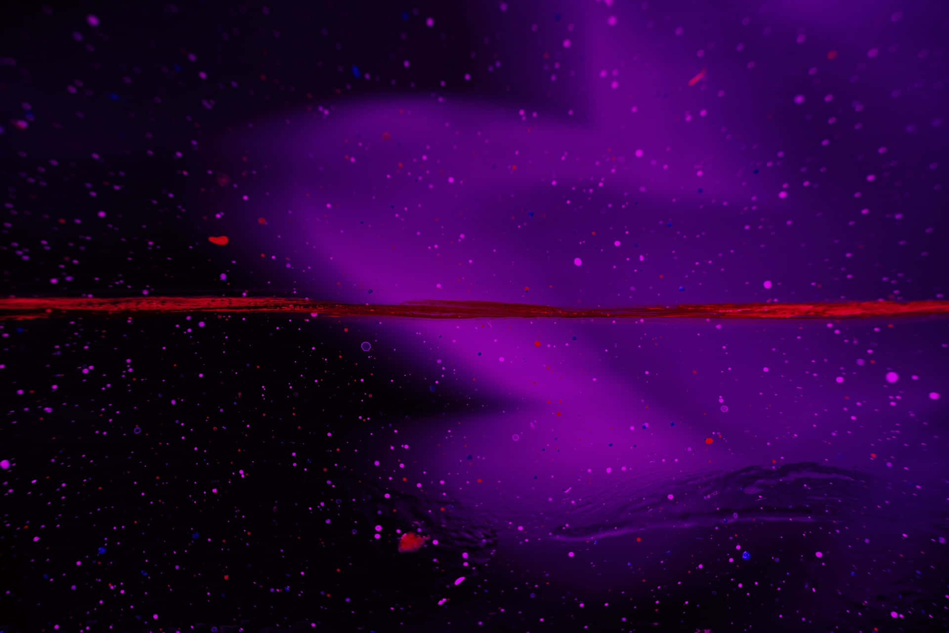 A burst of purple neon in the night sky.