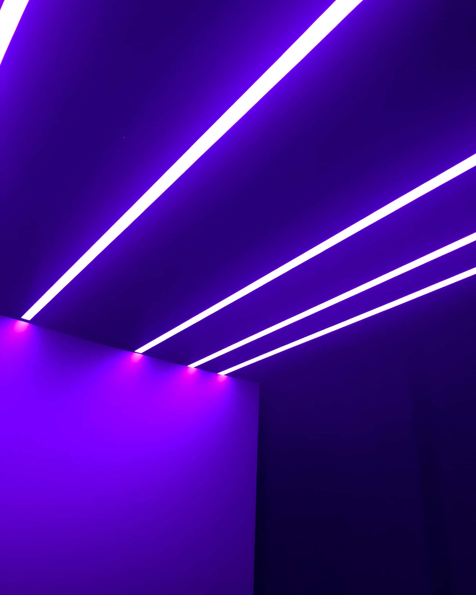 A Purple Light Is Shining In An Empty Room