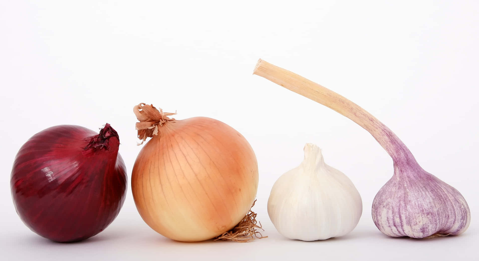 A Bunch of Colorful Purple Onions Wallpaper