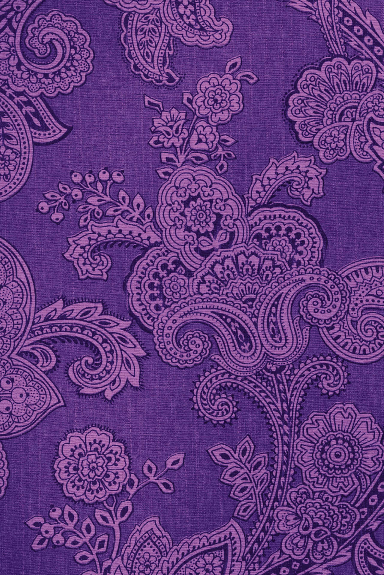 A Purple Paisley Pattern On A Fabric Wallpaper