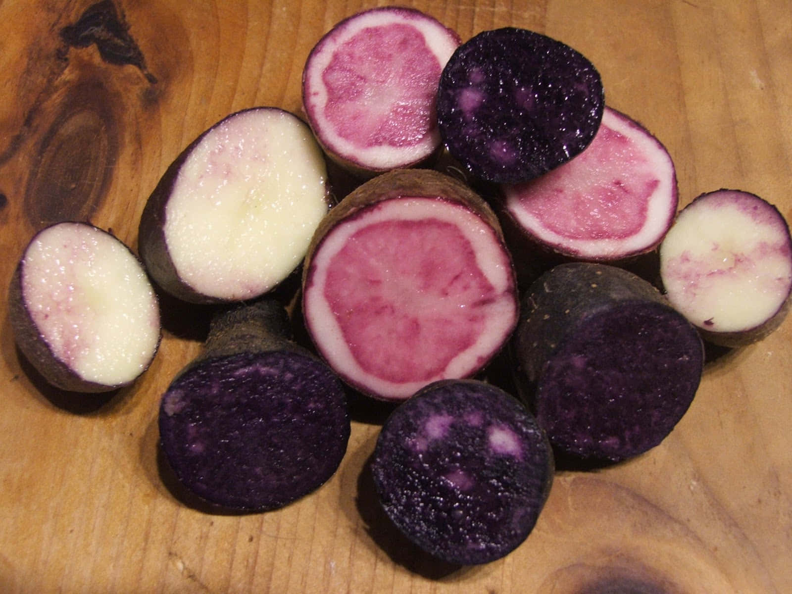 Colorful potatoes come in a variety of sizes and shades - like this Purple Potato at the local farmer's market. Wallpaper