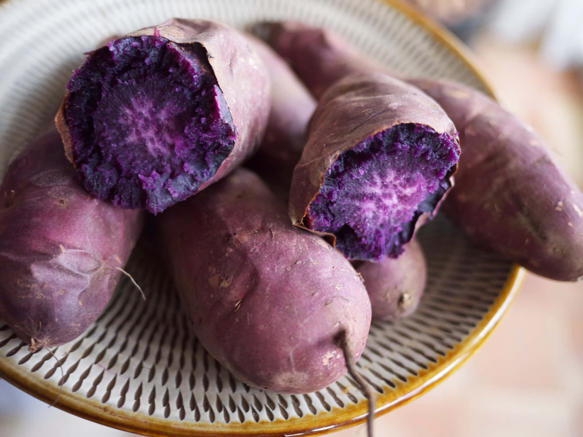A beautiful purple potato, vibrant and nutritious. Wallpaper