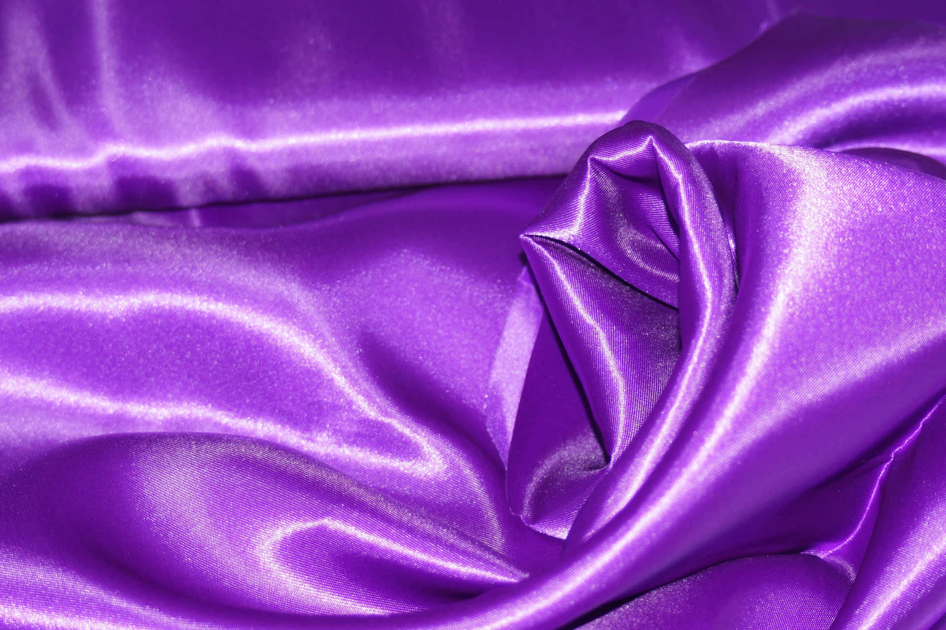 Glamorous and Sophisticated: Transform Your Home with this Stunning Purple Satin Wallpaper Wallpaper