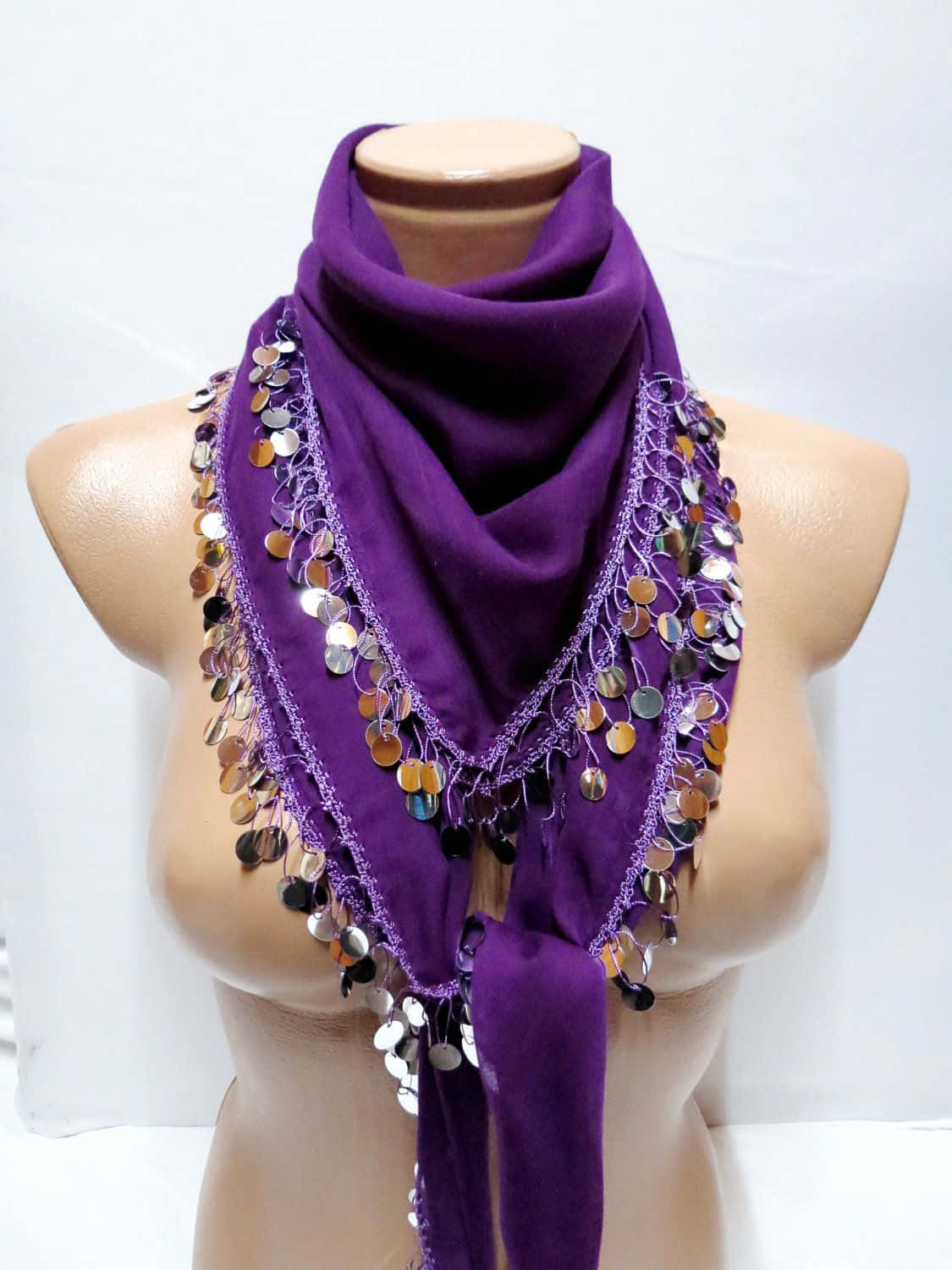 "Look Stylish and Add a Pop of Color with a Purple Scarf" Wallpaper