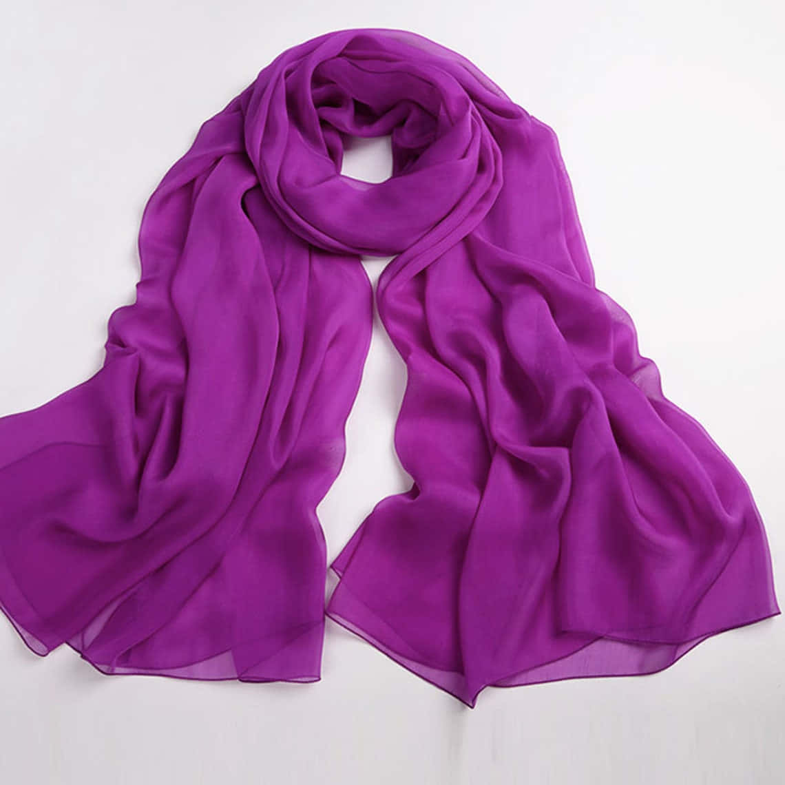 "Keep warm in style with this beautiful purple scarf" Wallpaper