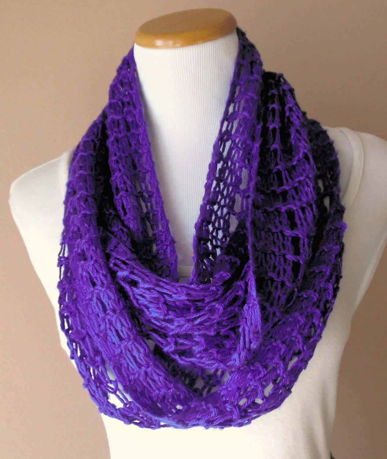 Add a touch of modern elegance to your cool-weather look with a cozy Purple Scarf Wallpaper