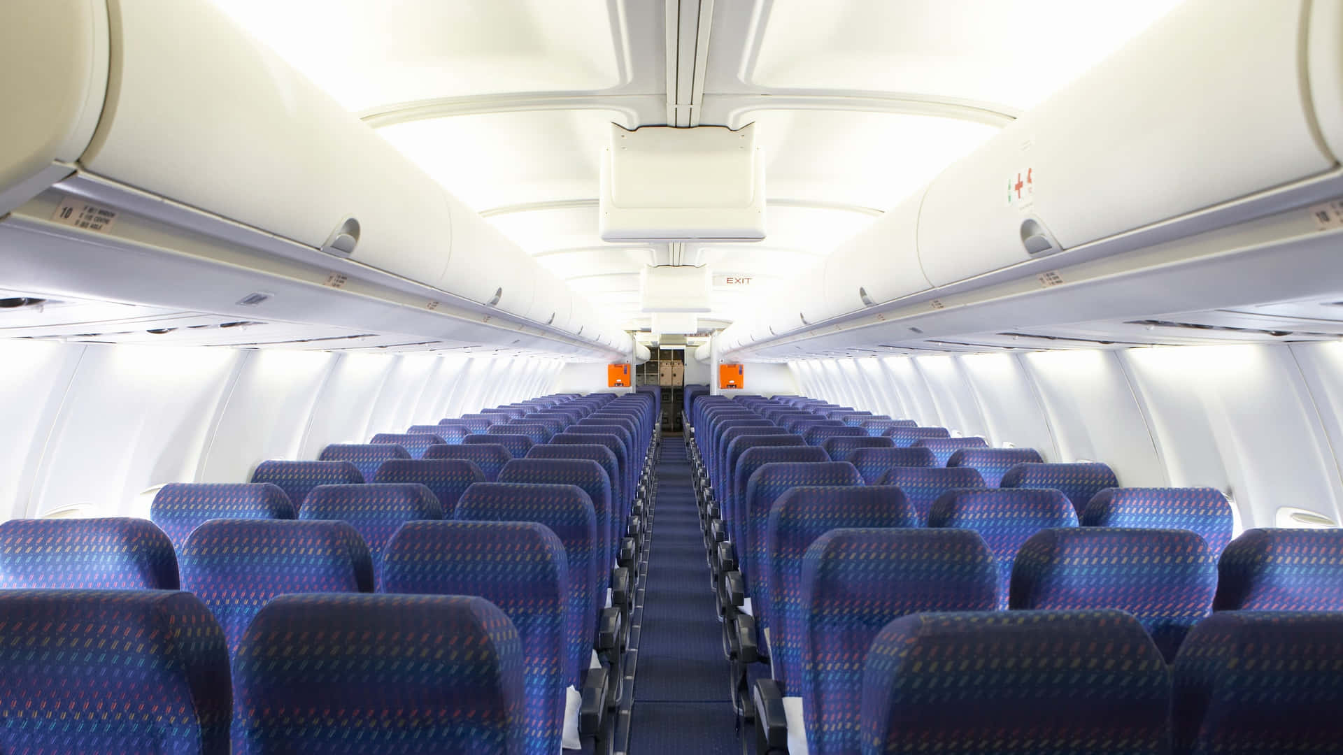 Purple Seat Row Inside Airplane Wallpaper