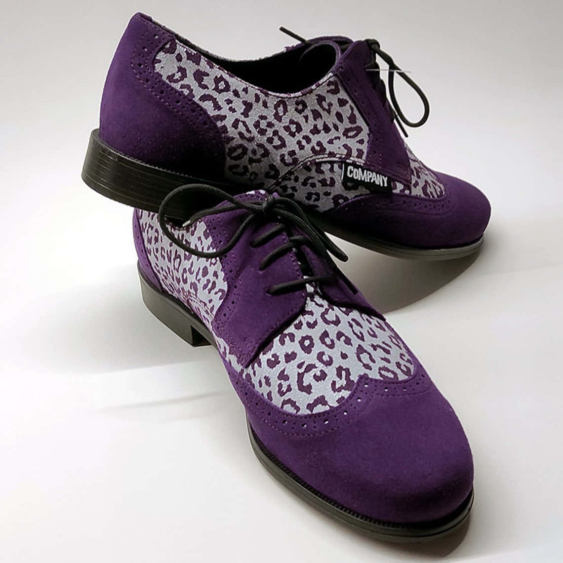 Download Purple Shoes 1140 X 1140 Wallpaper Wallpaper | Wallpapers.com