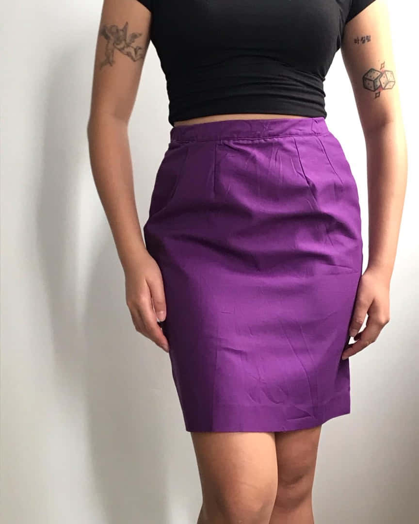 Look Chic In A Purple Skirt Wallpaper