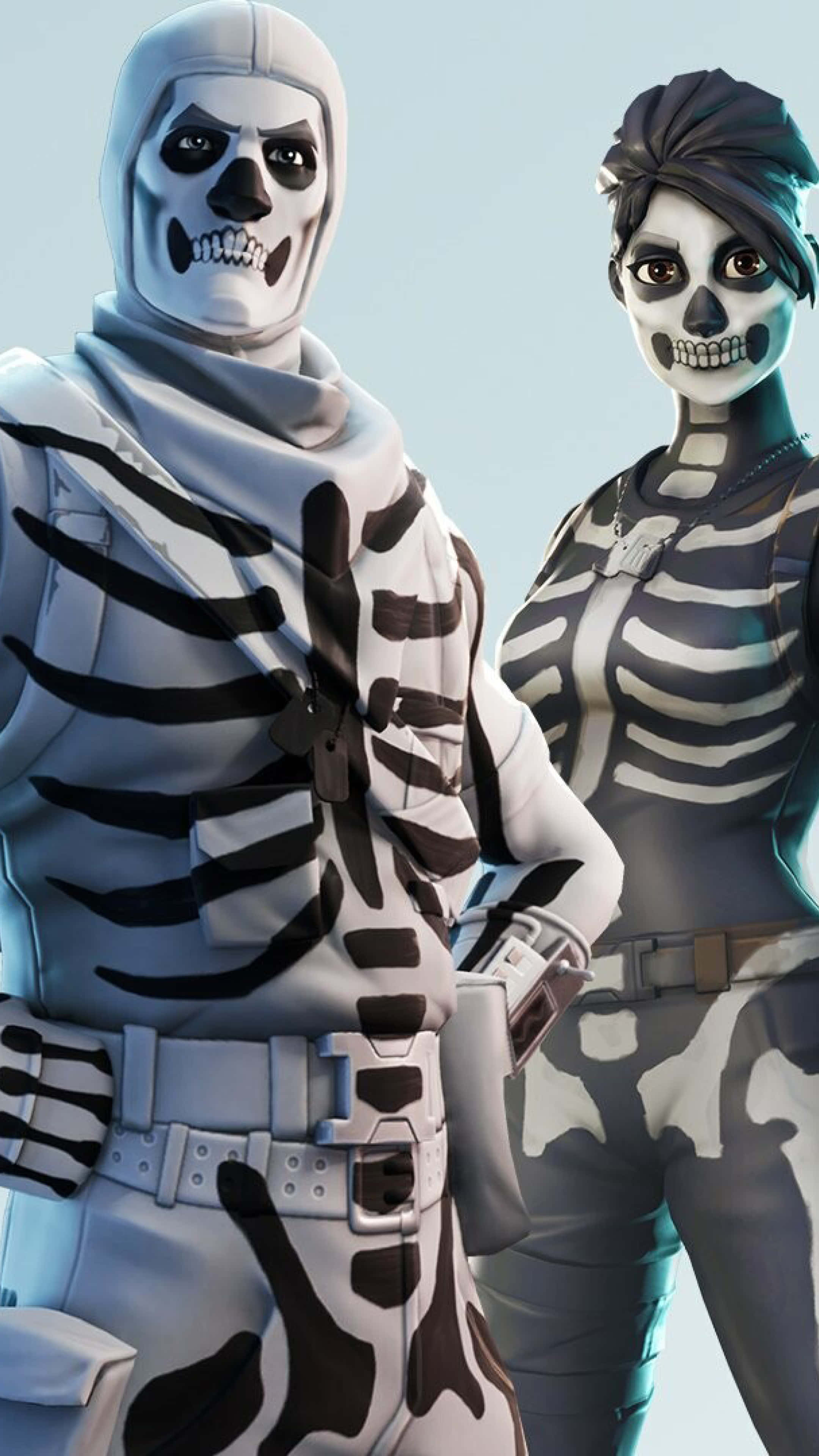 Two Skeletons Standing Next To Each Other Wallpaper