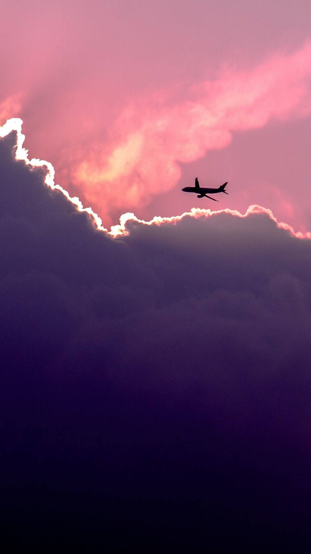 Purple Sky With Flying Airplane Android Wallpaper