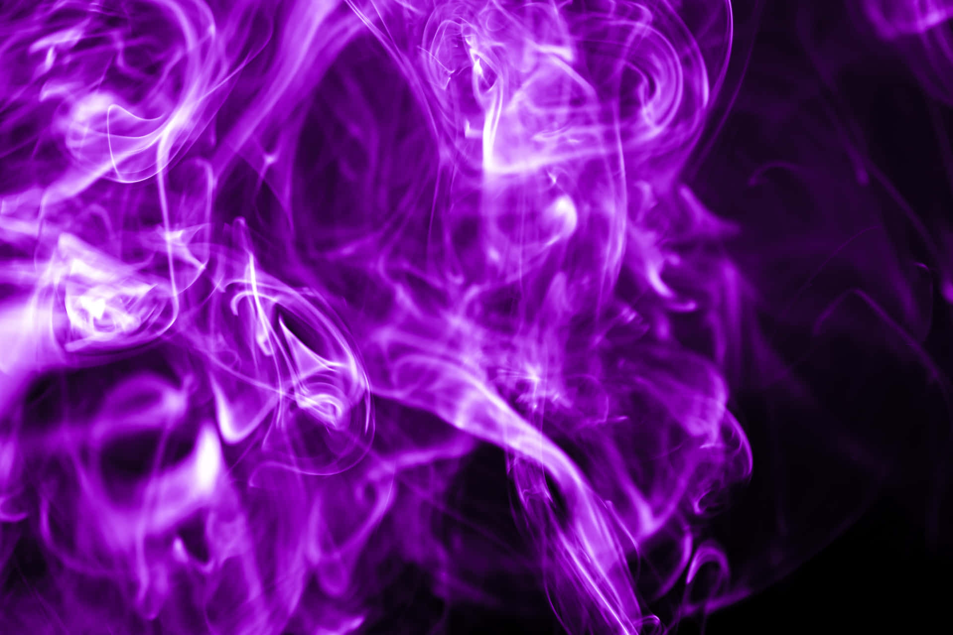 A breathtaking sight of purple smoke cascading from the sky.