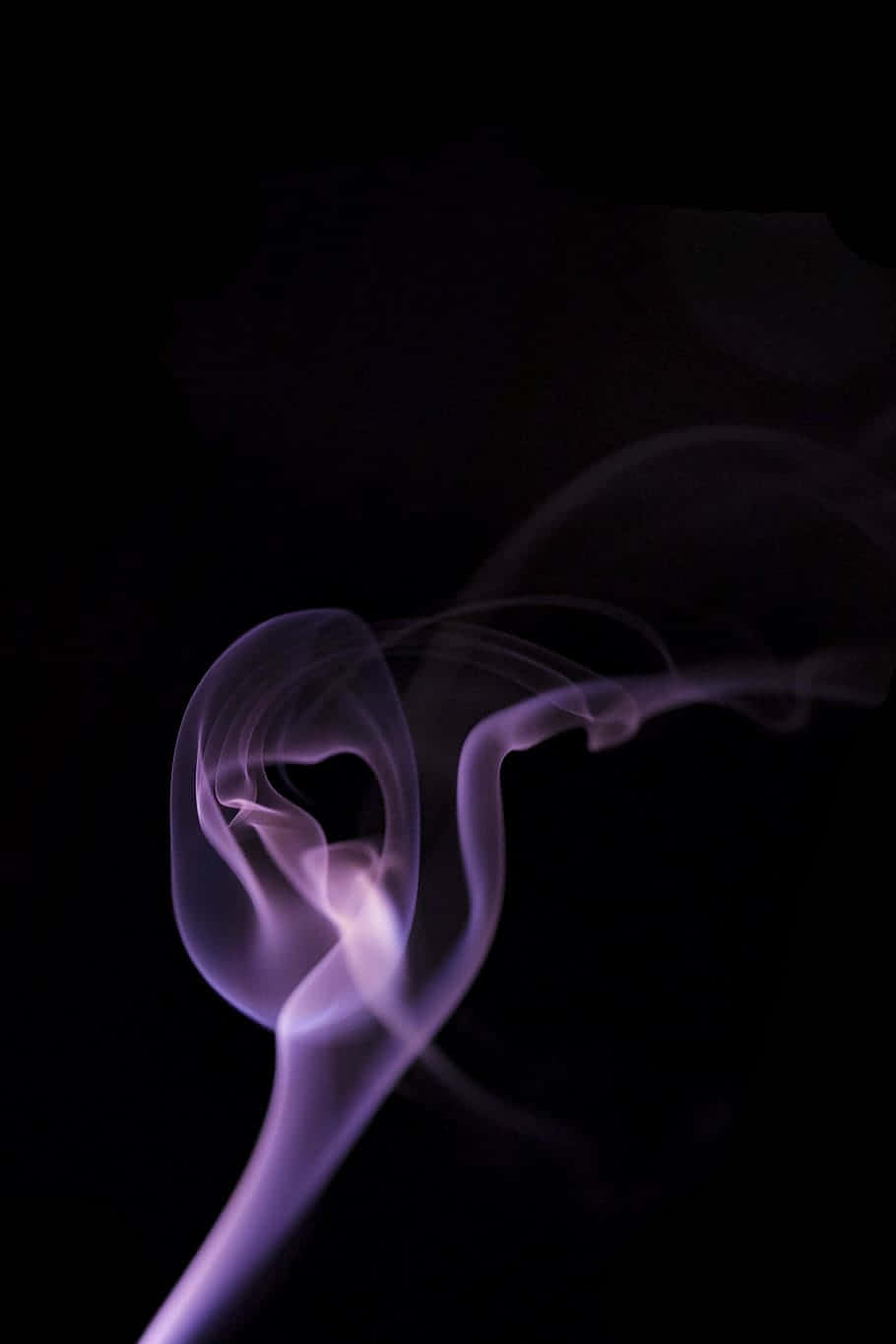 A Purple Smoke Is Blowing In The Air