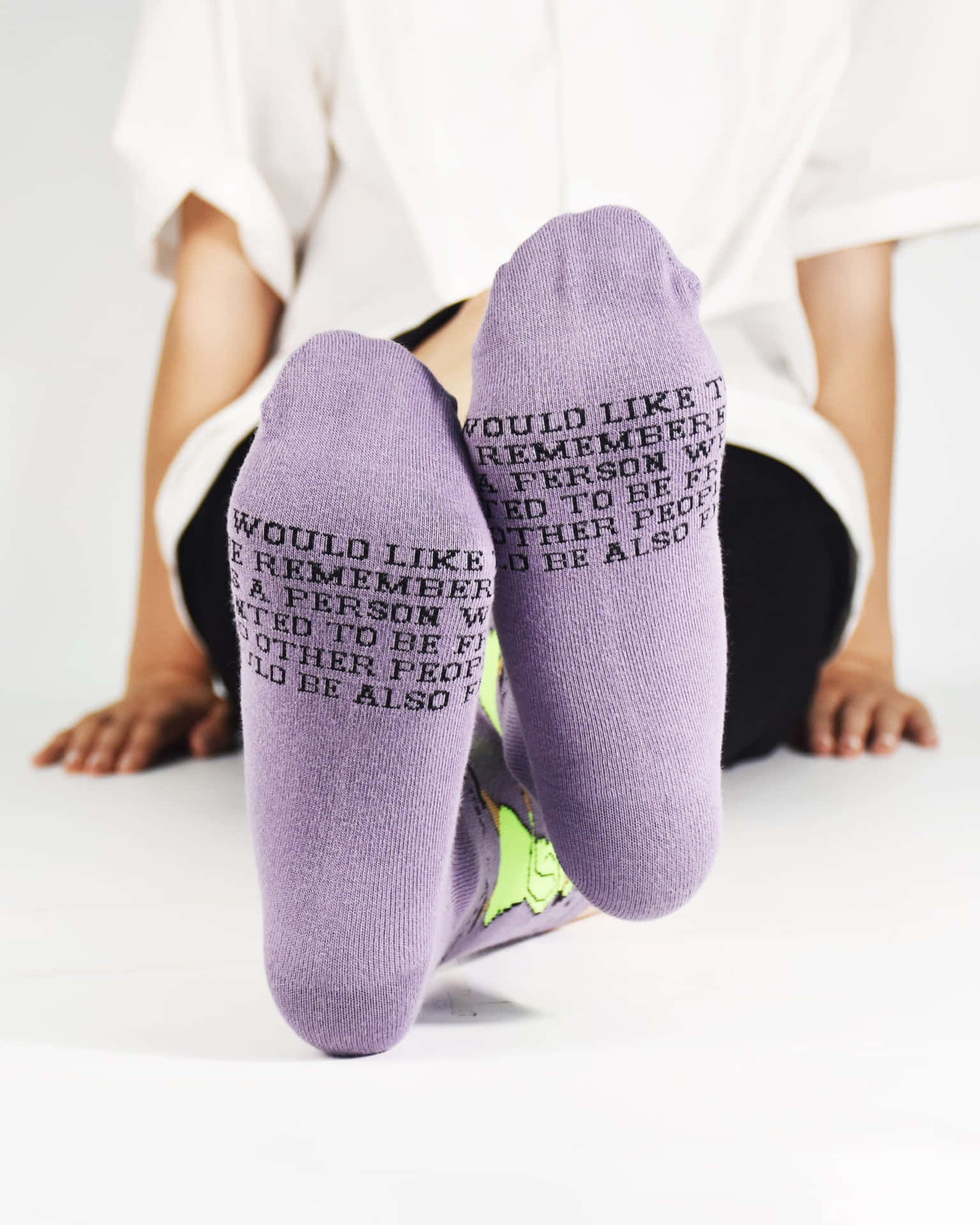 The Perfect Pop of Color - Get Your Purple Socks Today!" Wallpaper
