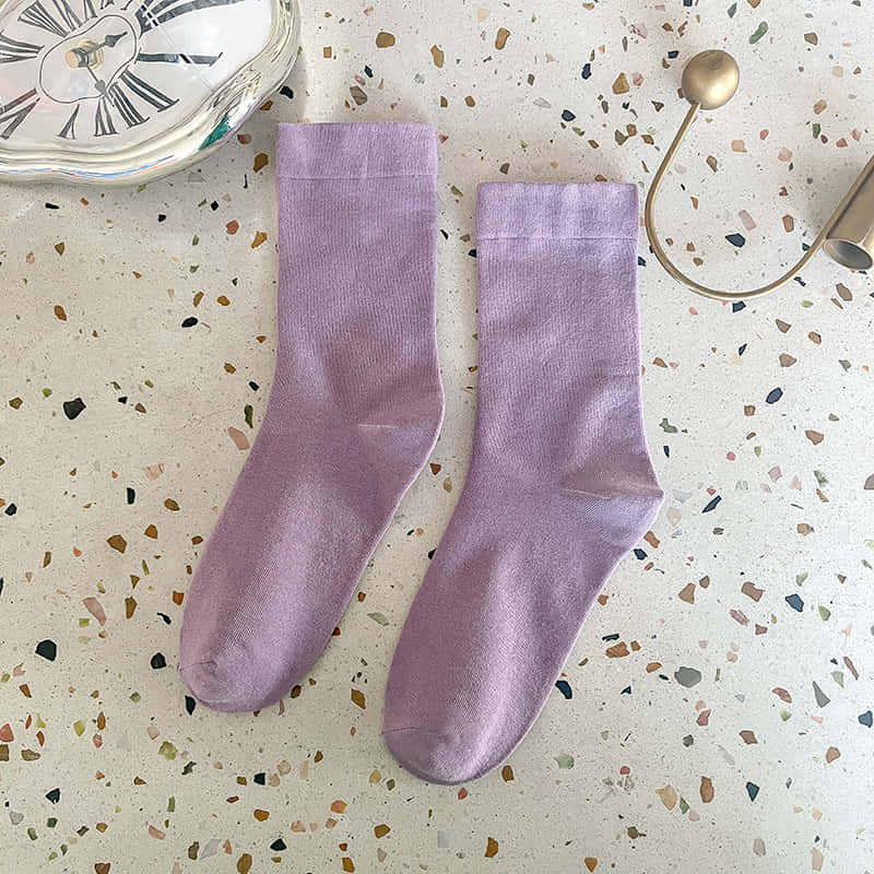 Show Off Your Style With Purple Socks Wallpaper