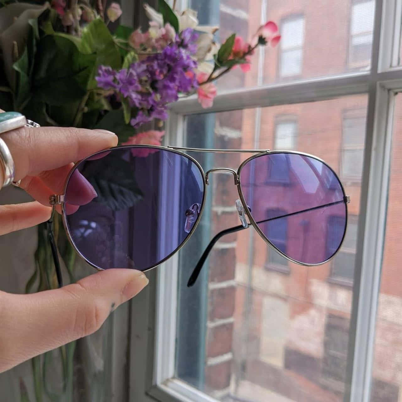 Complete your look with sharp purple sunglasses Wallpaper