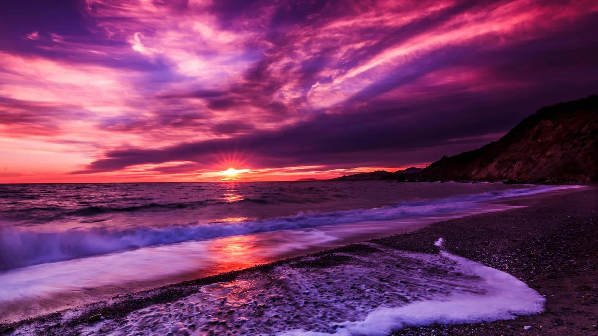 Stunning Purple Sunset with Serene Landscape Wallpaper