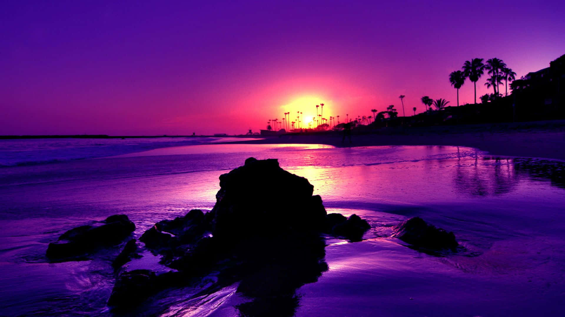 Stunning Purple Sunset Over Water Wallpaper