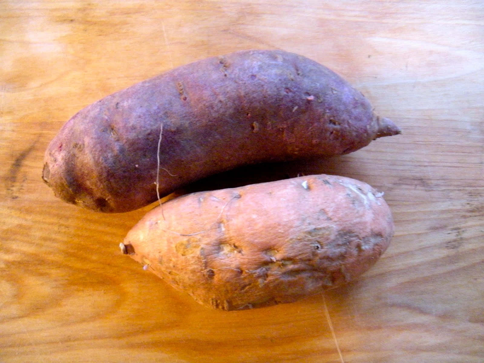 A bowl of a traditional Japanese purple sweet potato dish Wallpaper