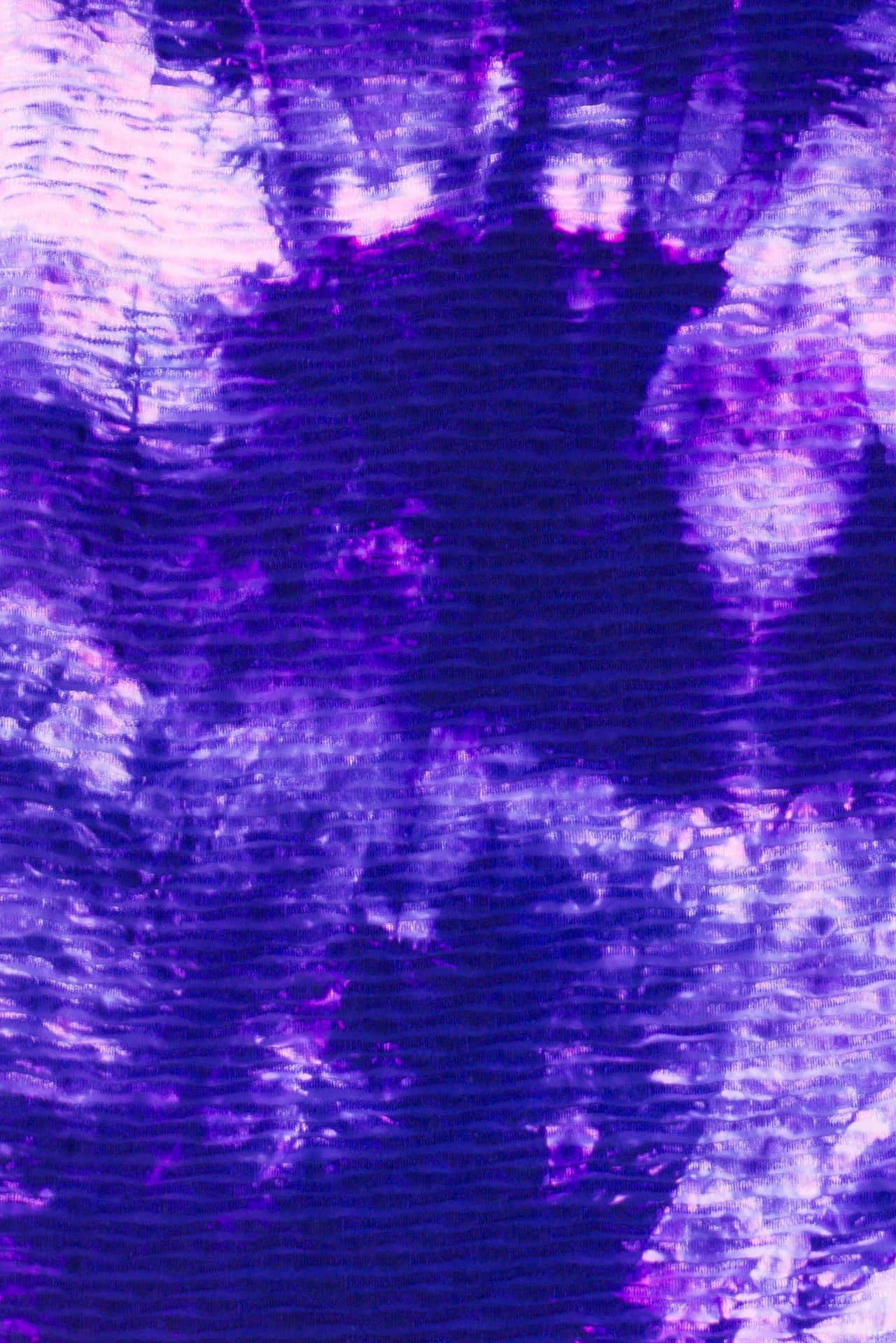 Unfondo De Pantalla Abstracto De Tinte Anudado En Tonos De Morado. Fondo de pantalla