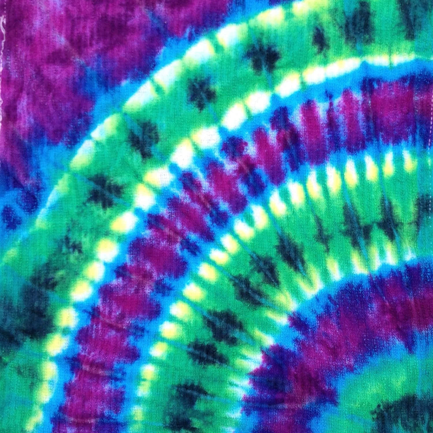 A Burst of Colorful Magenta and Purple Tiedye Wallpaper