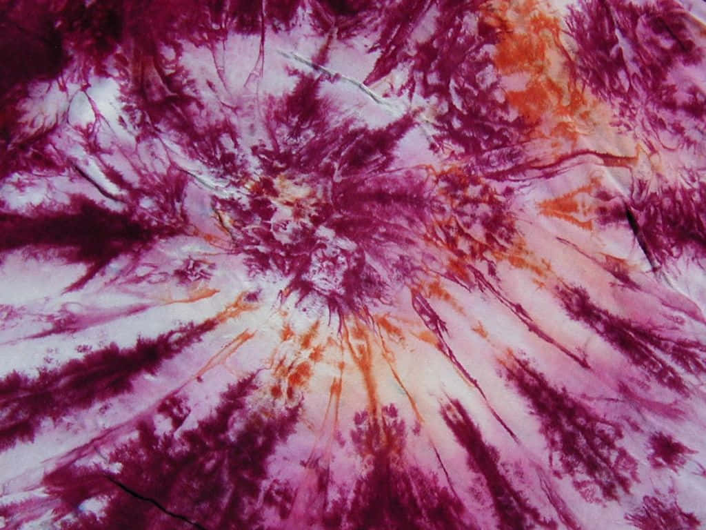 A Close Up Of A Tie Dyed Fabric Wallpaper
