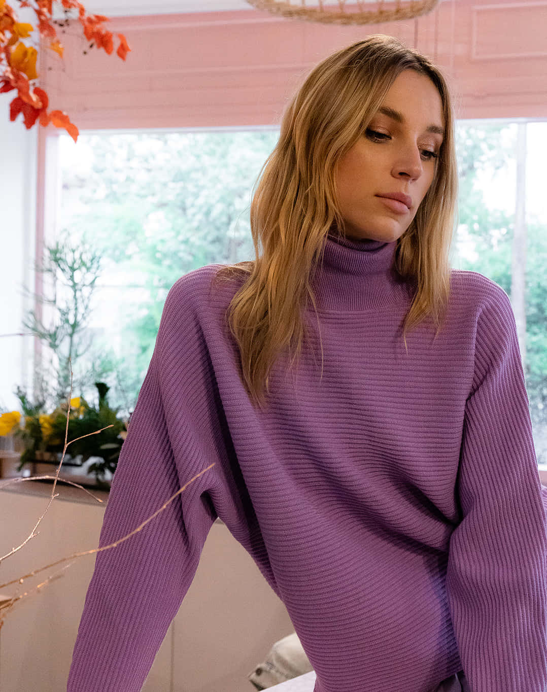 Stay warm and stylish with a Purple Turtle-neck Sweater Wallpaper