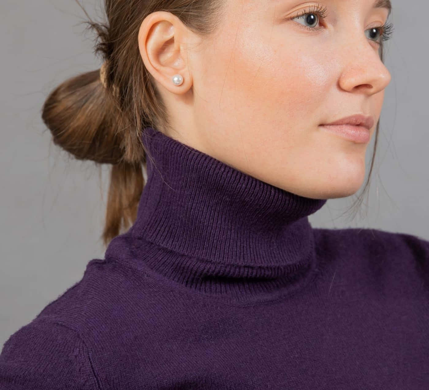 Refresh your wardrobe for fall with this stylish purple turtle neck sweater. Wallpaper
