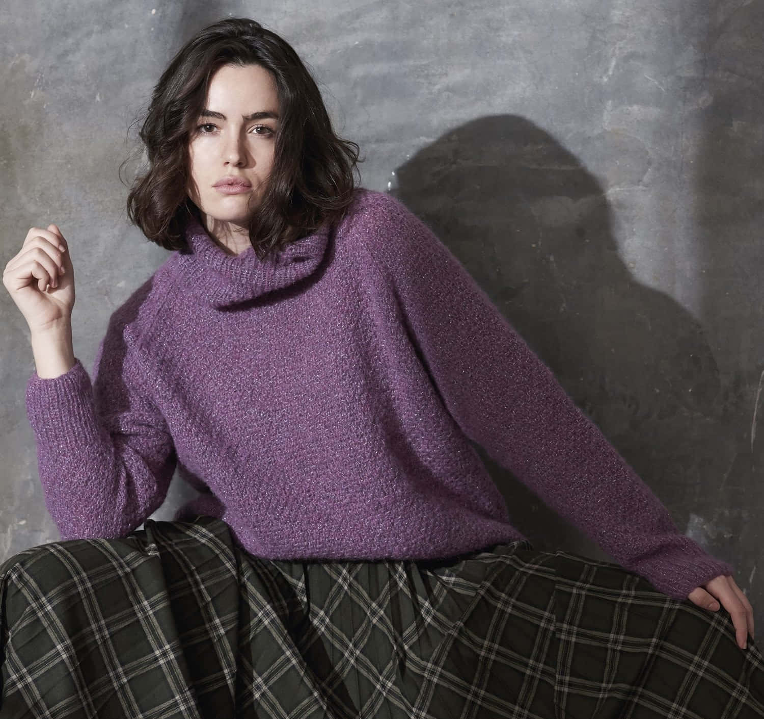 Stay cozy with this stylish purple turtle-neck sweater. Wallpaper