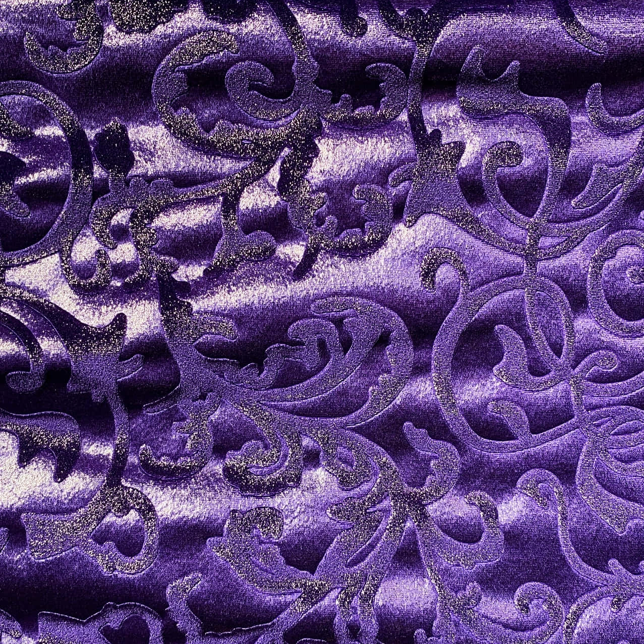 Experience the Luxurious Feel of Purple Velvet Wallpaper