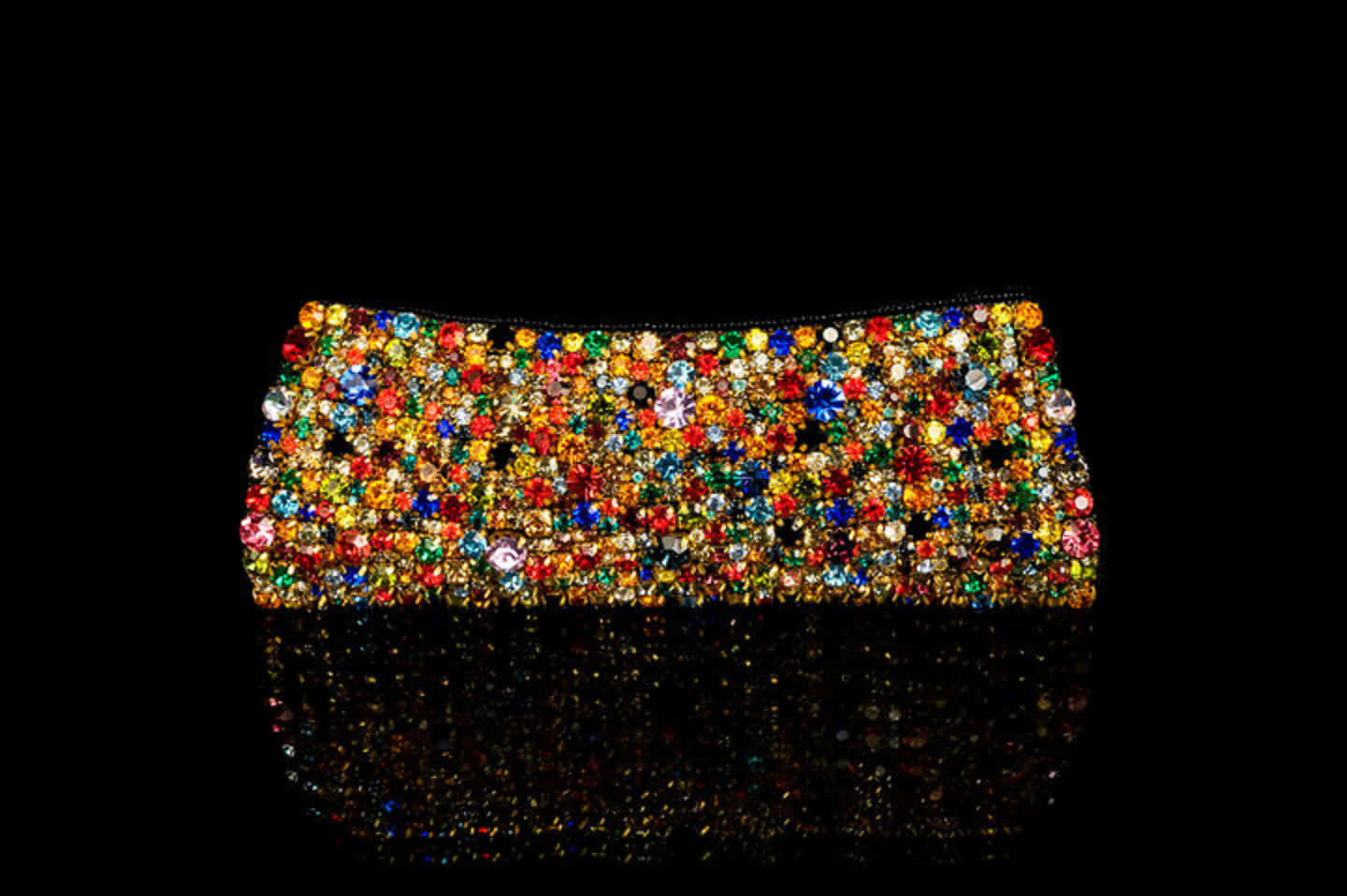 A Colorful Clutch Bag With Multi Colored Beads