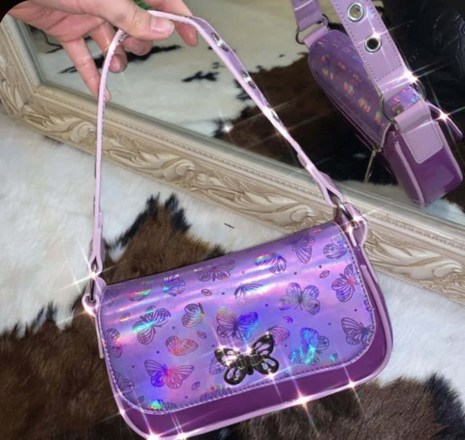 A Purple Purse With A Butterfly On It