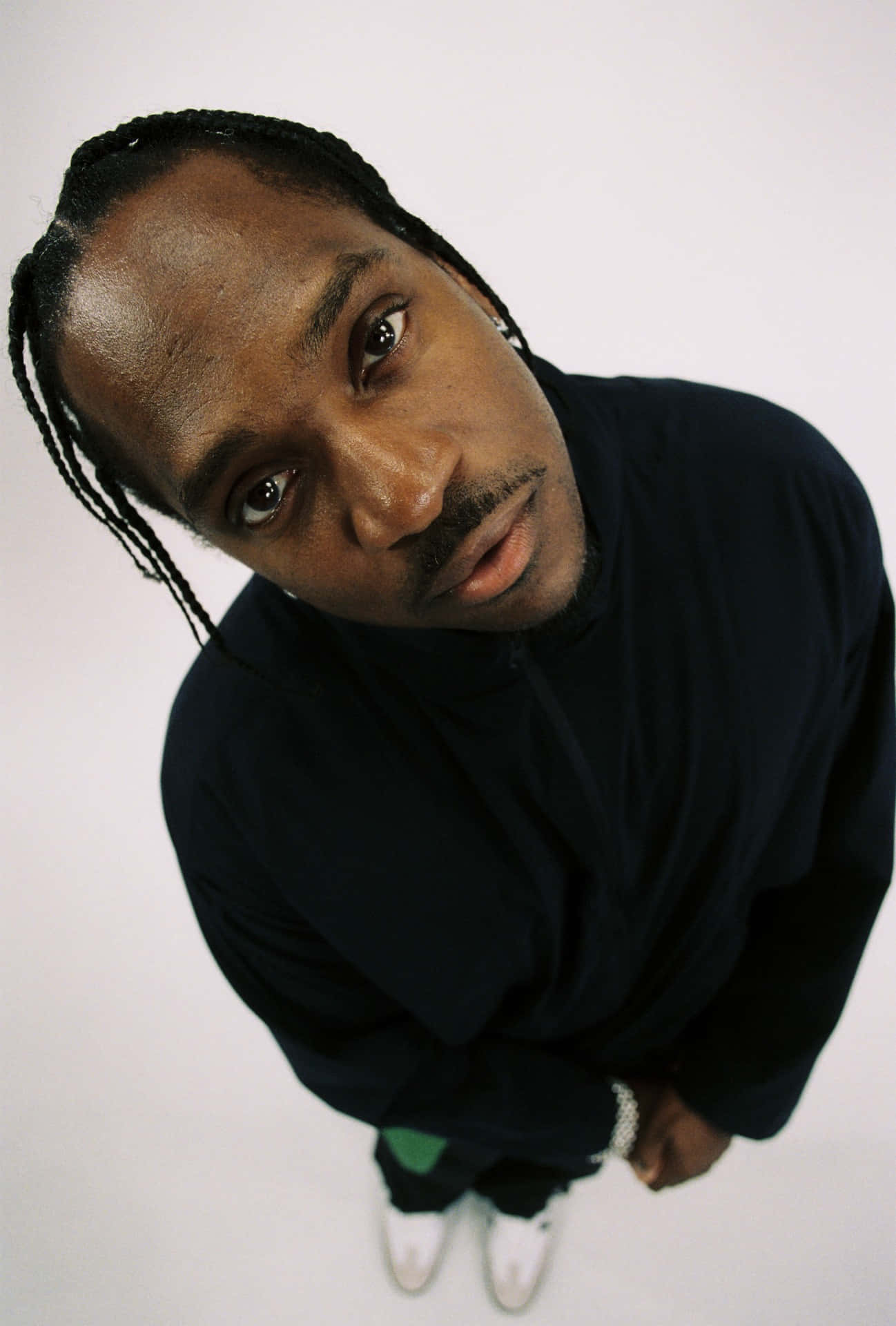 Pusha_ T_ Looking_ Upward_ Portrait Wallpaper