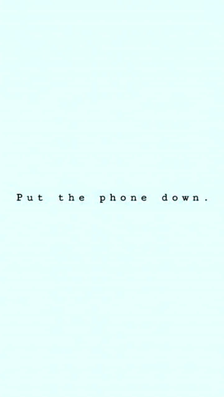 A Blue Background With The Words Put The Phone Down Wallpaper