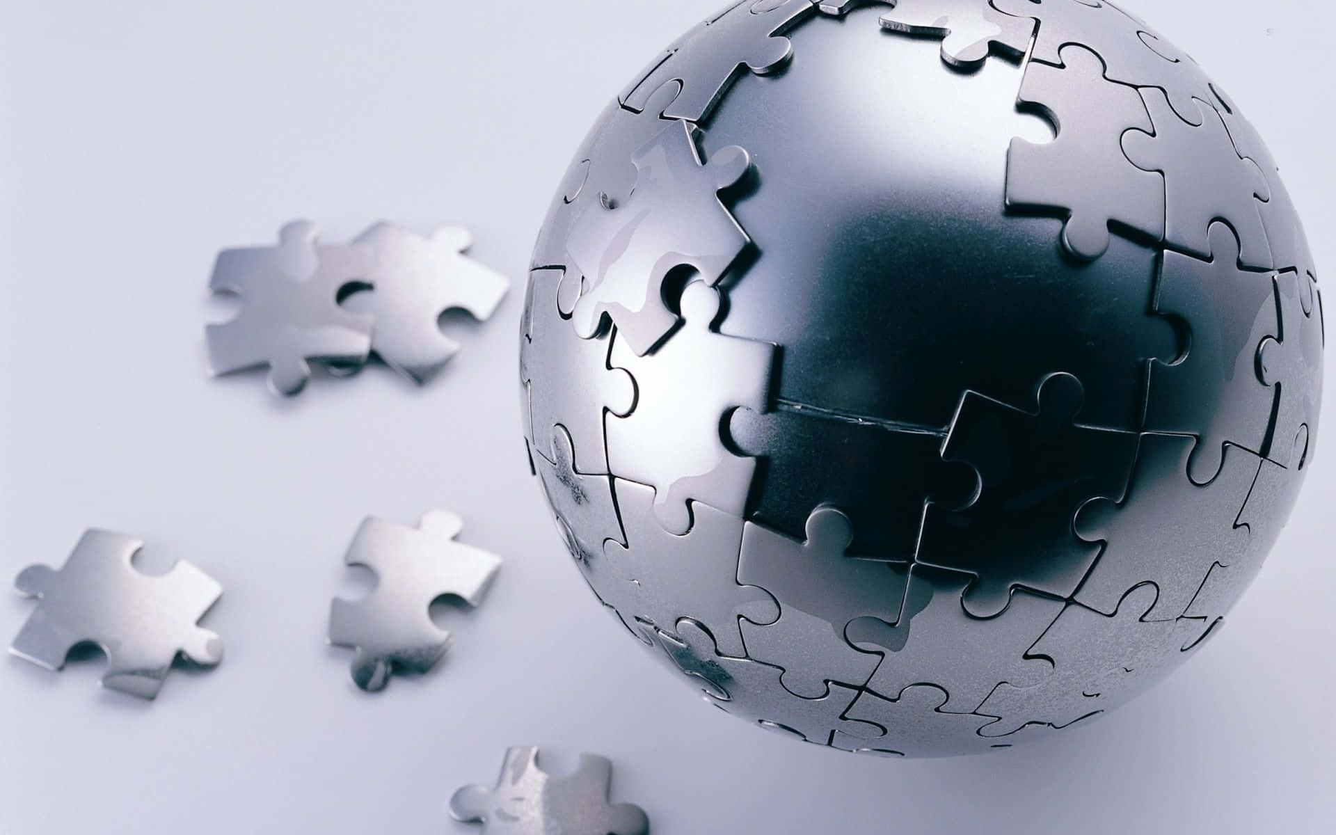 Sleek Silver Puzzle Globe Picture
