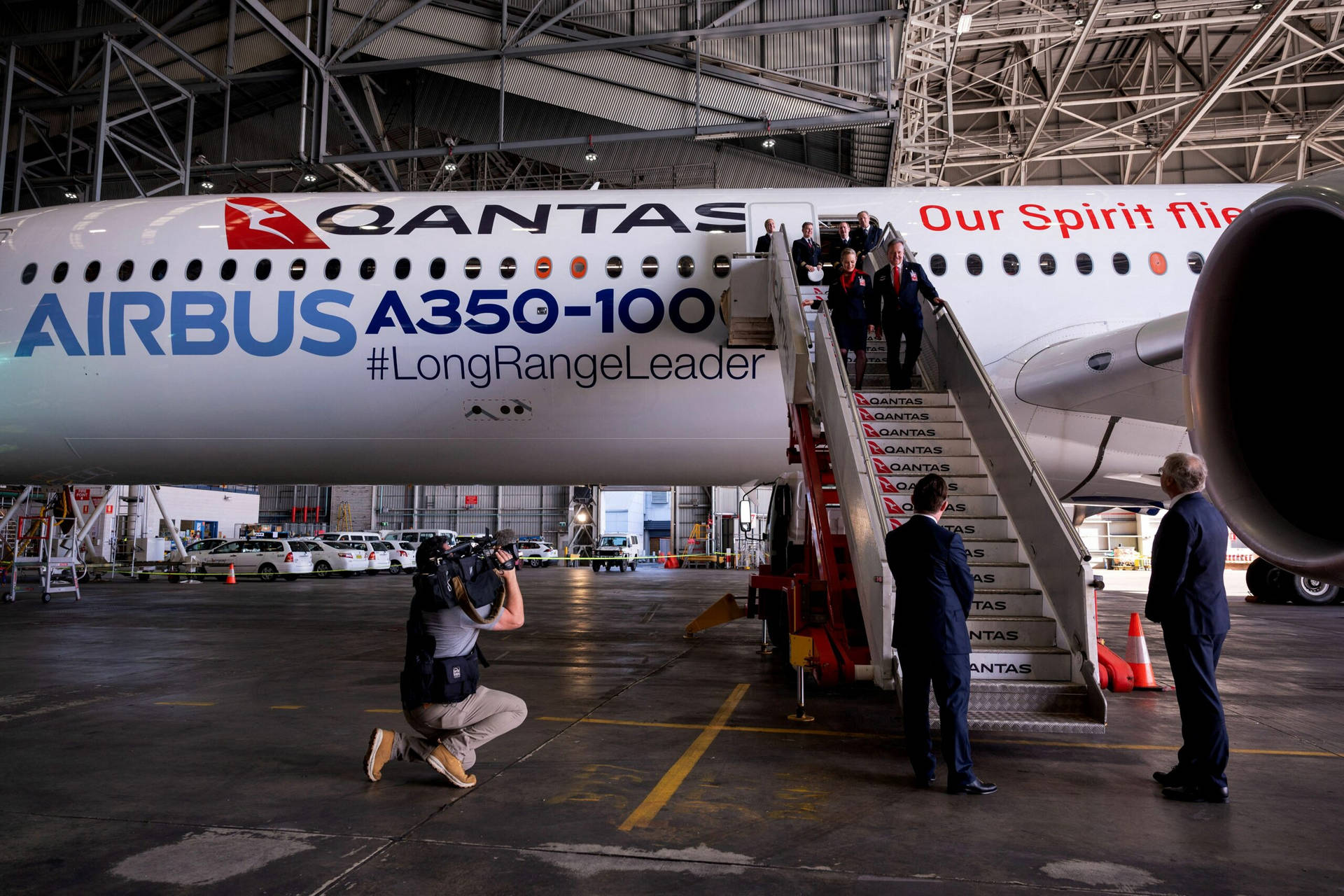 Qantas Airways Executives posing in front of Airbus A350 Wallpaper