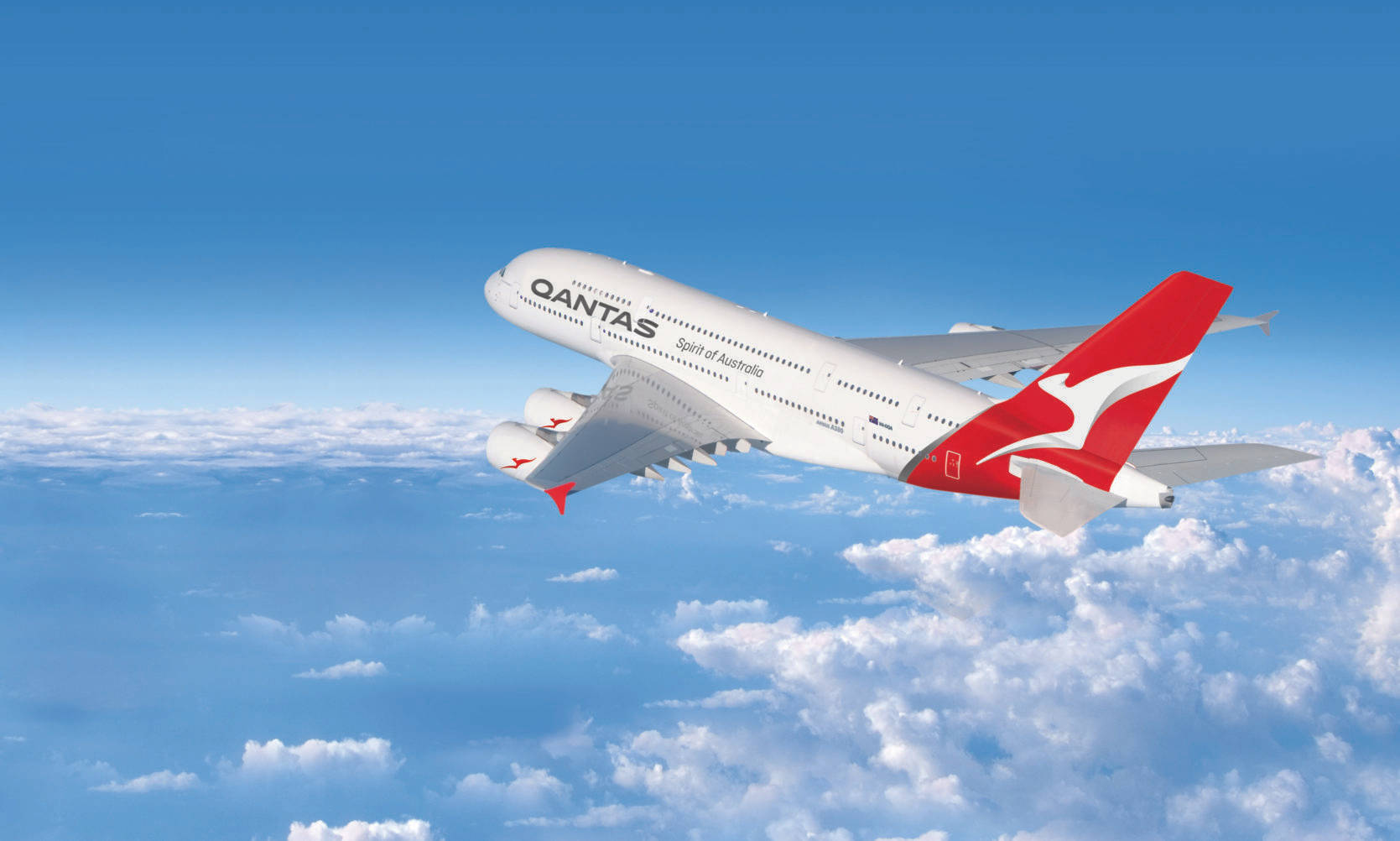 Aviónde Pasajeros De Qantas Airways En El Cielo Azul Fondo de pantalla