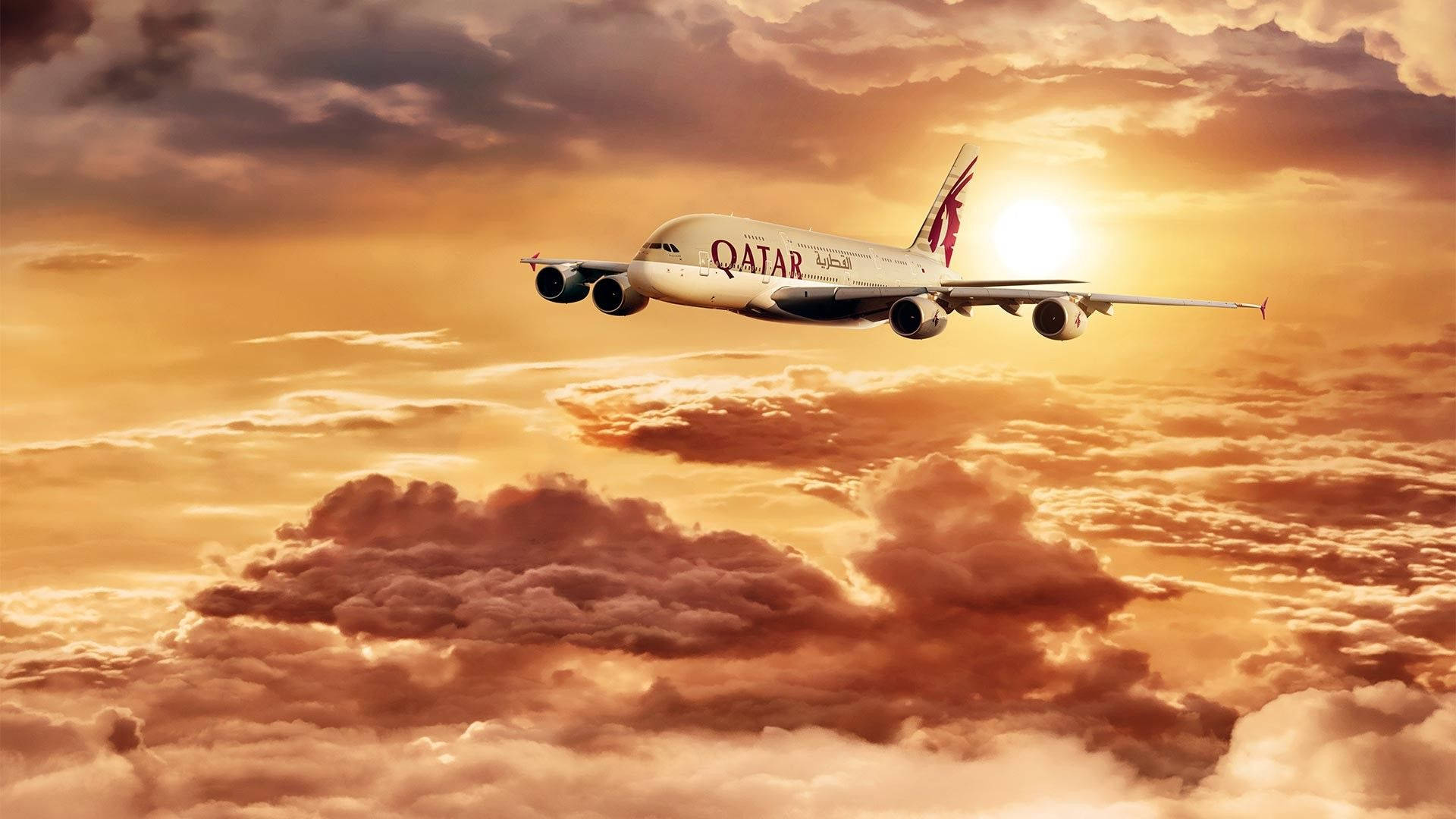 Qatar Airways Flying Through The Sunset Background